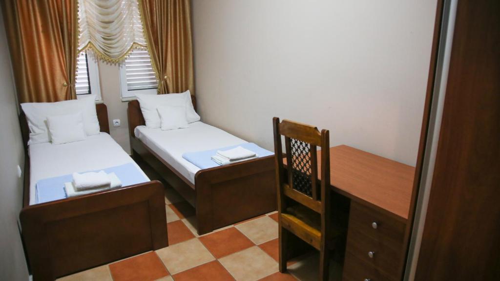 Postel nebo postele na pokoji v ubytování Apartments Misko