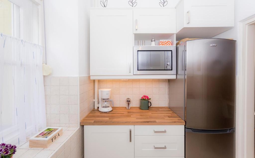 A kitchen or kitchenette at Souper Apartments Downtown-Király Street