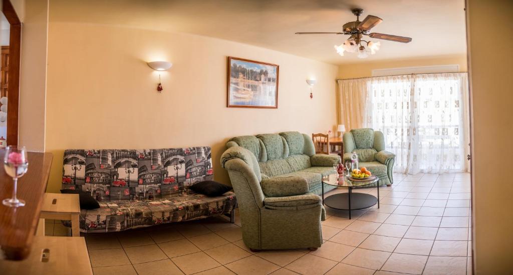 Posezení v ubytování Apartment Paraiso Royal