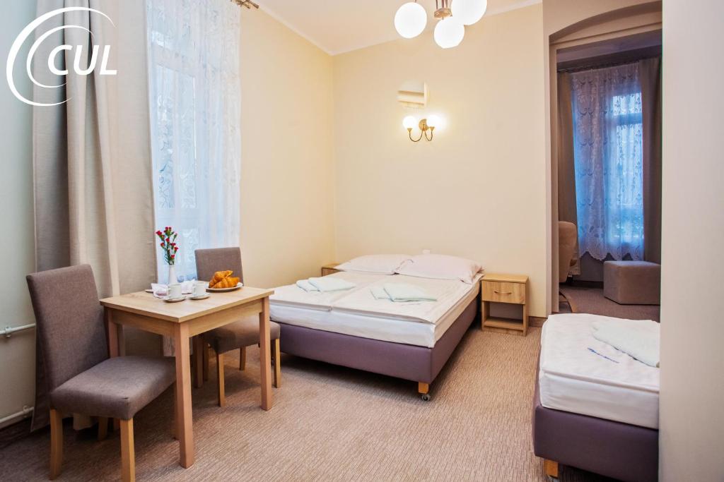 Postel nebo postele na pokoji v ubytování OSW Świnoujście Rybitwa