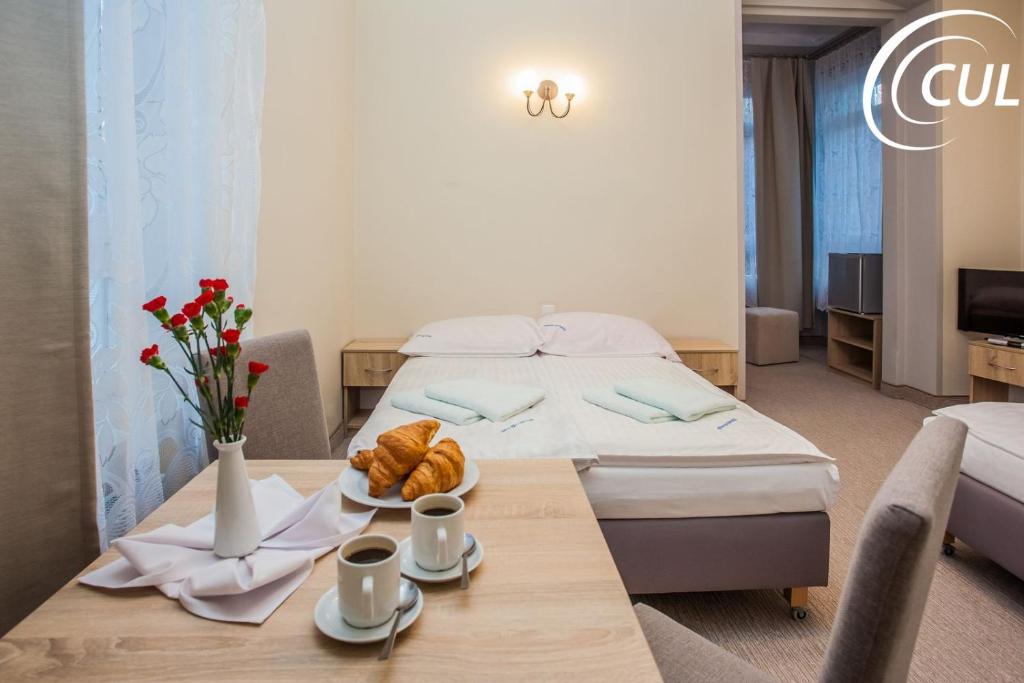Postel nebo postele na pokoji v ubytování OSW Świnoujście Rybitwa
