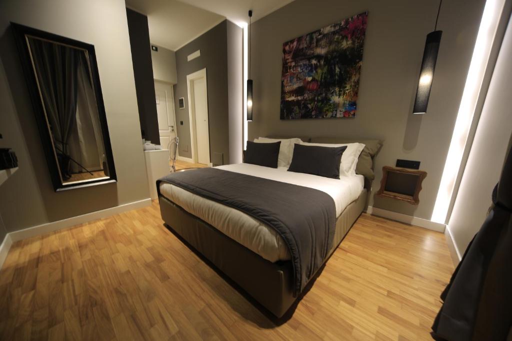 Postel nebo postele na pokoji v ubytování K Rooms