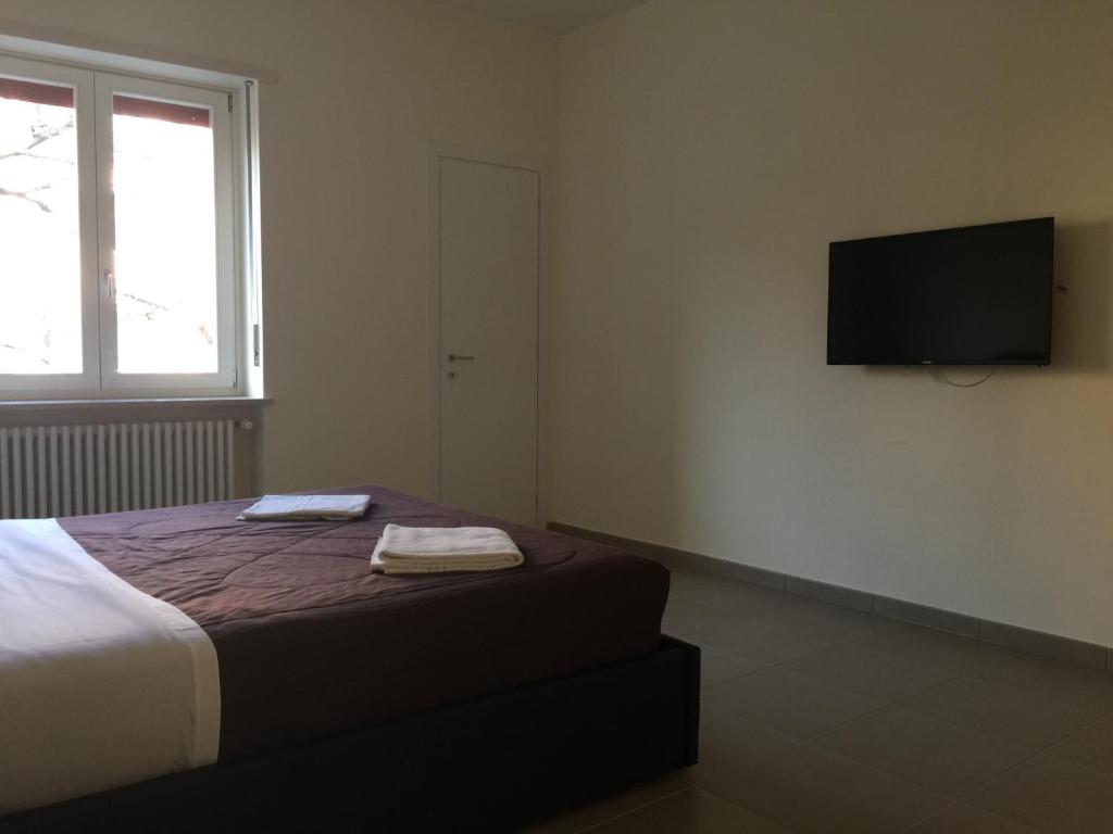 Postel nebo postele na pokoji v ubytování 3Jolie Rooms
