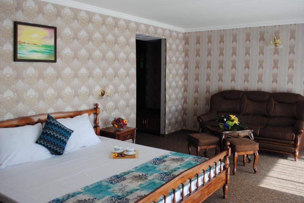 Postel nebo postele na pokoji v ubytování Mercury Hotel-Premium All Inclusive