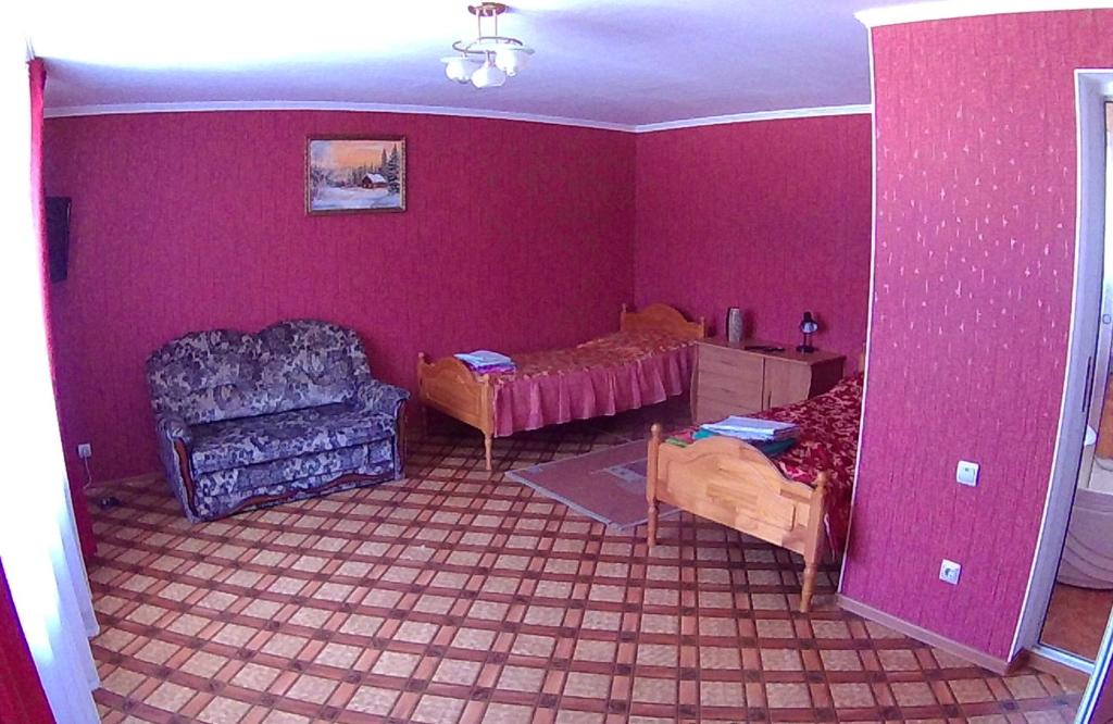 Una cama o camas en una habitación de Guest house U Lary
