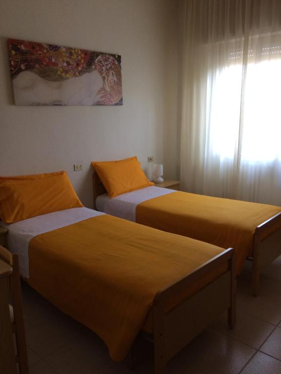 Postel nebo postele na pokoji v ubytování Albergo Stella