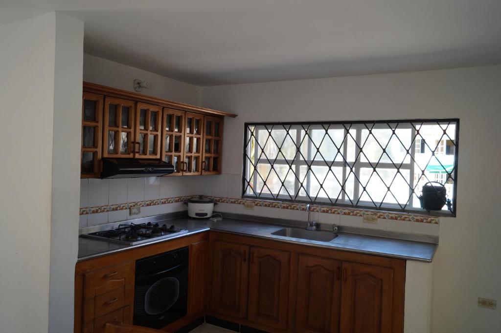 Kuchyň nebo kuchyňský kout v ubytování Condominio Punta Bolivar