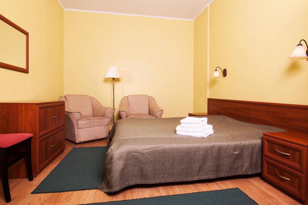 Postel nebo postele na pokoji v ubytování Mini-hotel on Geroiv Energetykiv Street 18