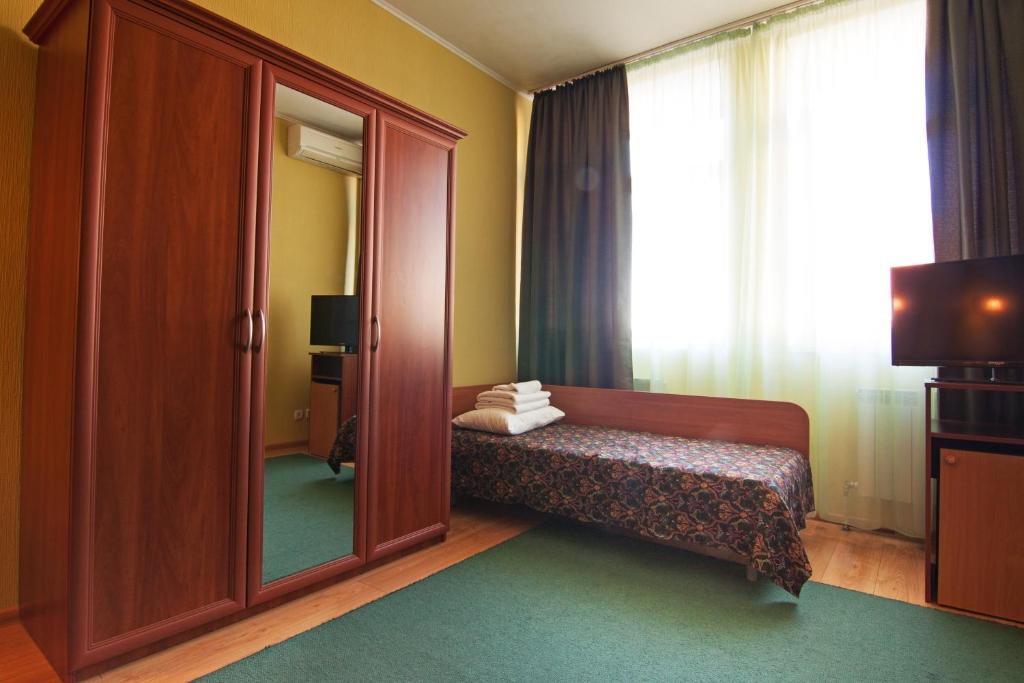Postel nebo postele na pokoji v ubytování Mini-hotel on Geroiv Energetykiv Street 18