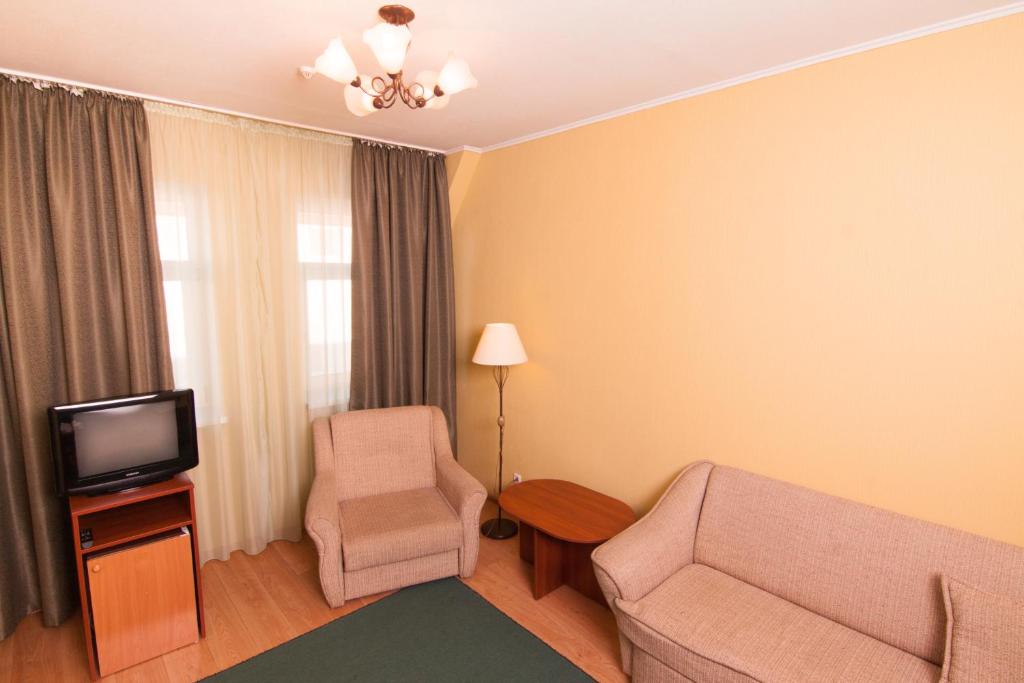 TV a/nebo společenská místnost v ubytování Mini-hotel on Geroiv Energetykiv Street 18