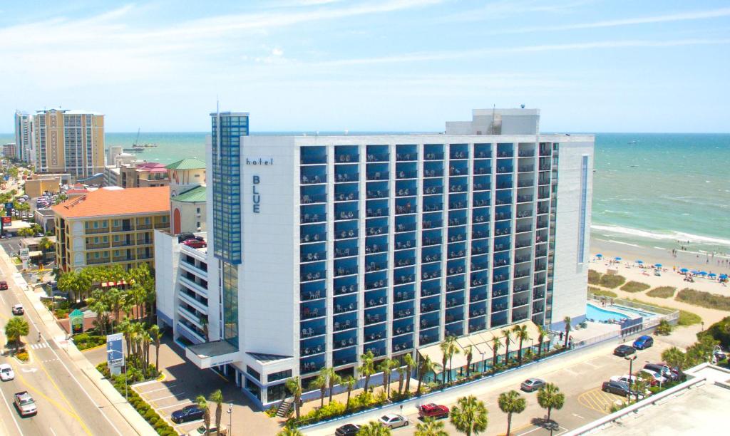 an aerial view of a large building on the beach at Hotel Blue in Myrtle Beach