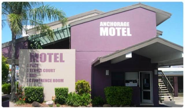 a building with a sign on the front of it at Anchorage Motor Inn in Caloundra