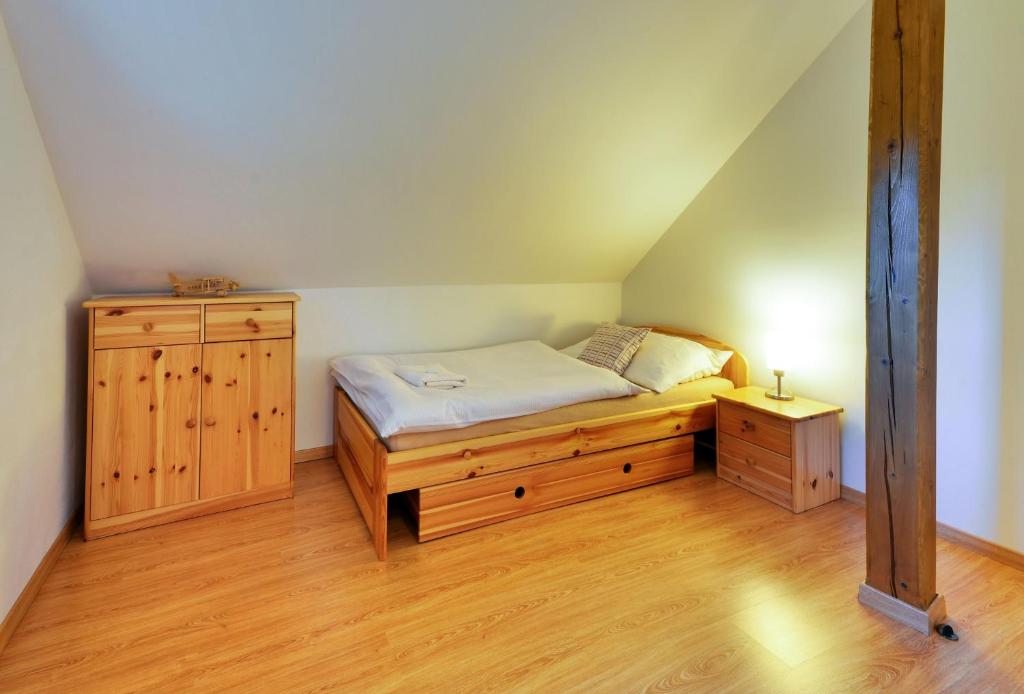 Postel nebo postele na pokoji v ubytování Horský domek Pod Ucháčem