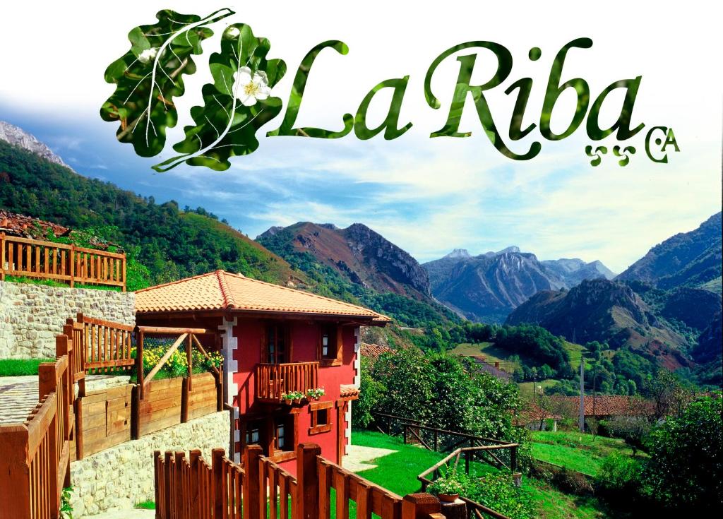 a sign that reads la rida with a view of mountains at Casa Rural La Riba in Sames