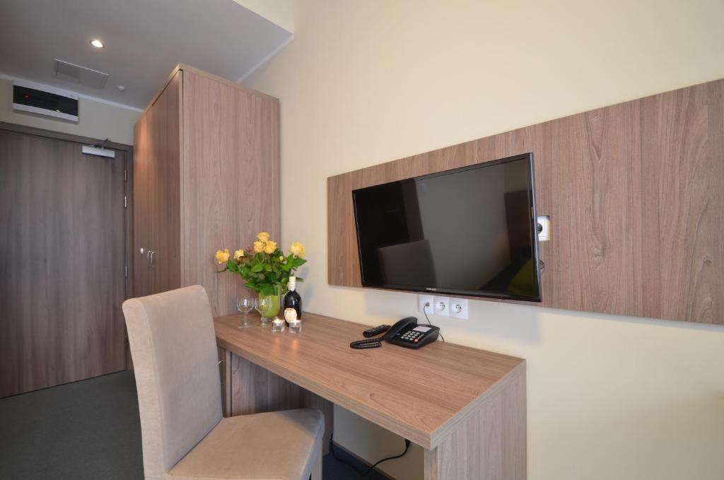 TV a/nebo společenská místnost v ubytování Hotel Zorza