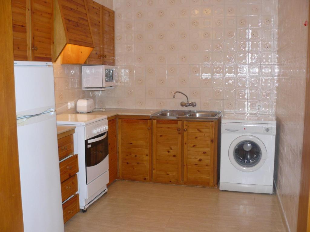 Kuchyň nebo kuchyňský kout v ubytování Apartamentos Jardin Playa