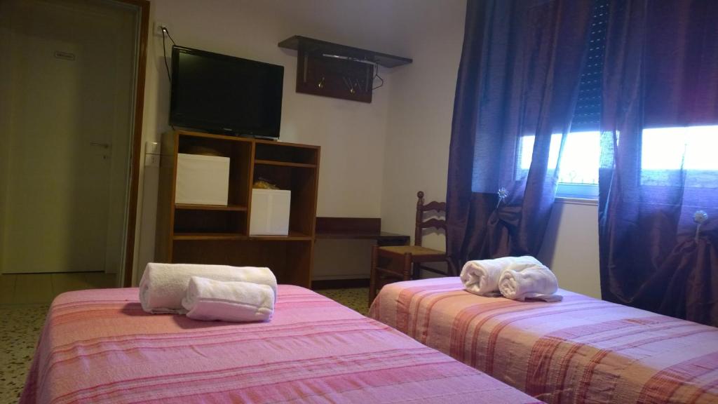 Postel nebo postele na pokoji v ubytování Hotel Cubamia