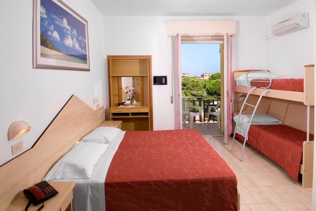 Postel nebo postele na pokoji v ubytování Hotel Levante