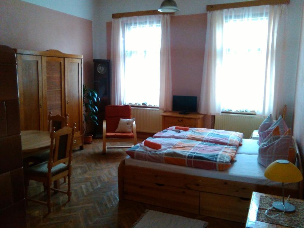 Łóżko lub łóżka w pokoju w obiekcie Apartma Františkovy Lázně