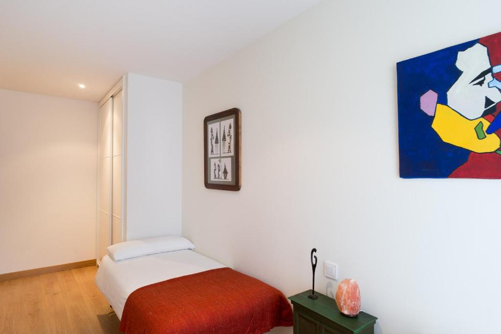 Posteľ alebo postele v izbe v ubytovaní San Roque Center - IB. Apartments
