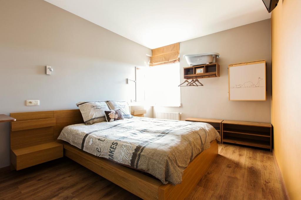 Postel nebo postele na pokoji v ubytování B&B Hoeve de Schapenkop