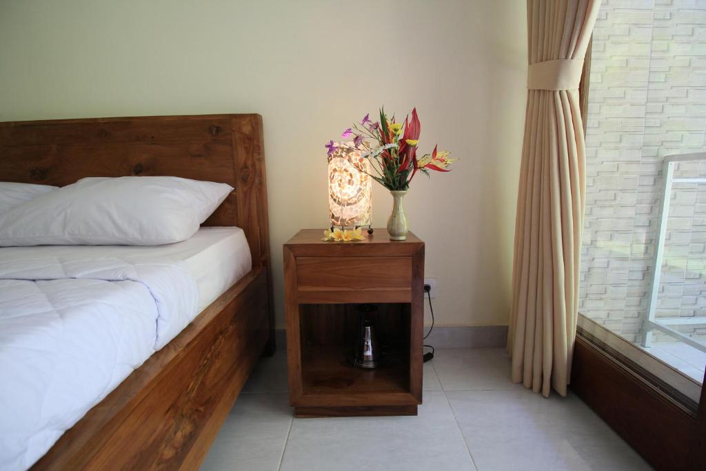 Postel nebo postele na pokoji v ubytování Teba Jati Guest House