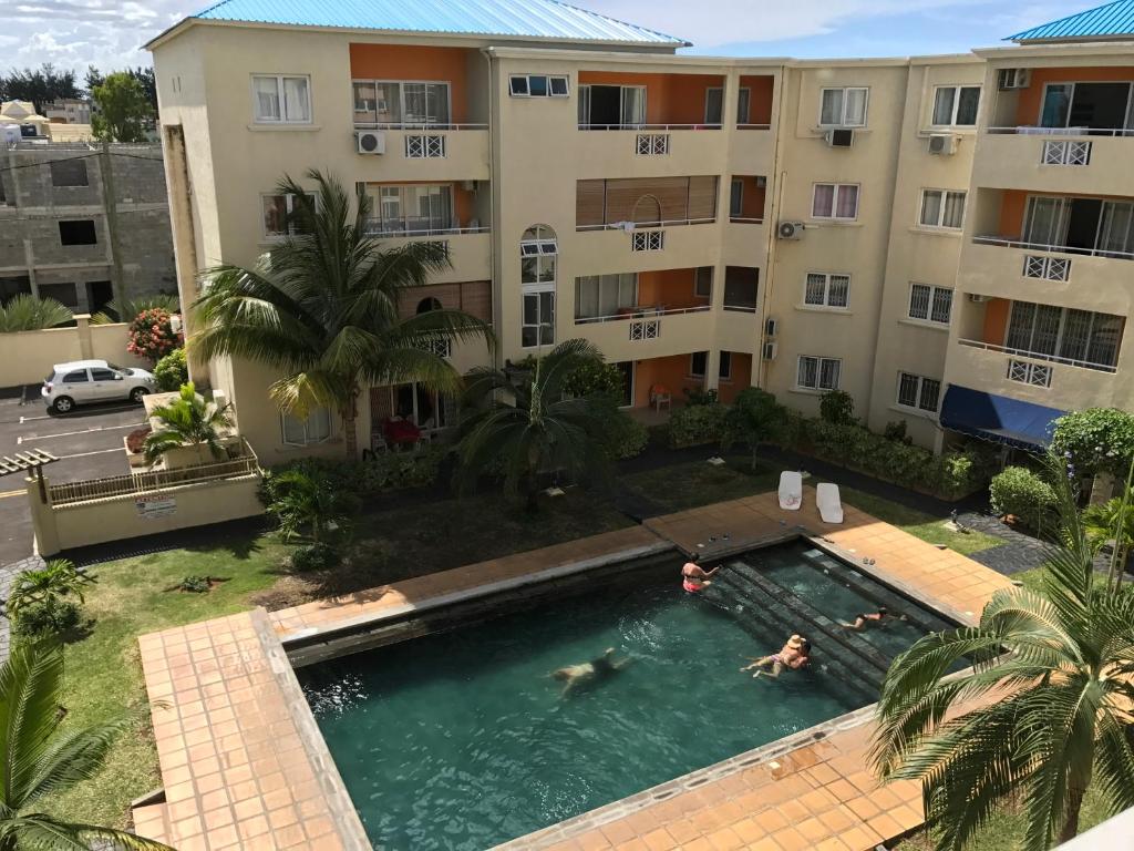 Pogled na bazen u objektu Apartment Tamarinier Complexe ili u blizini