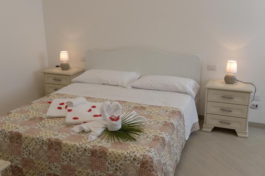 A bed or beds in a room at Domus Antiqua Residence