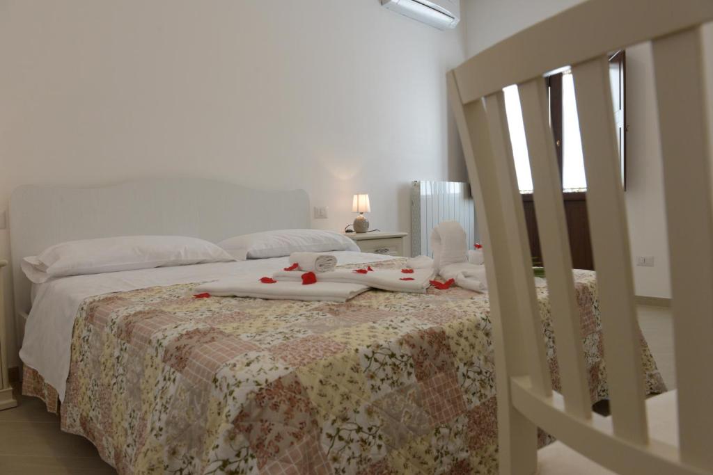 A bed or beds in a room at Domus Antiqua Residence