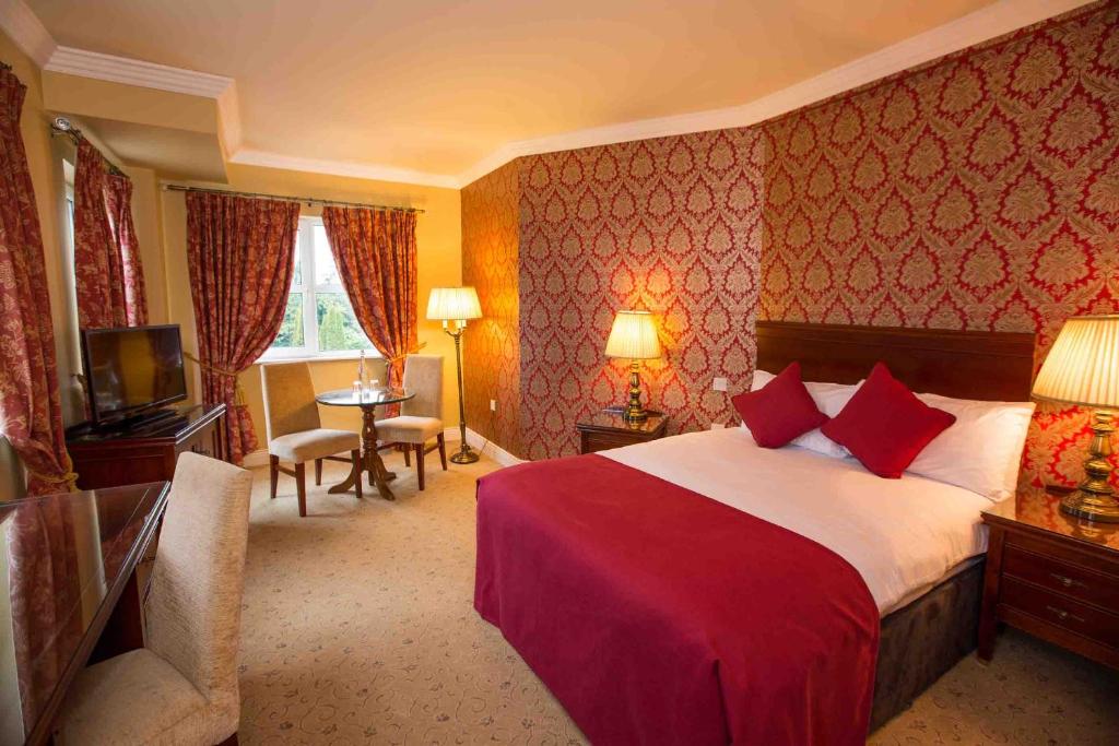Voodi või voodid majutusasutuse Anner Hotel toas