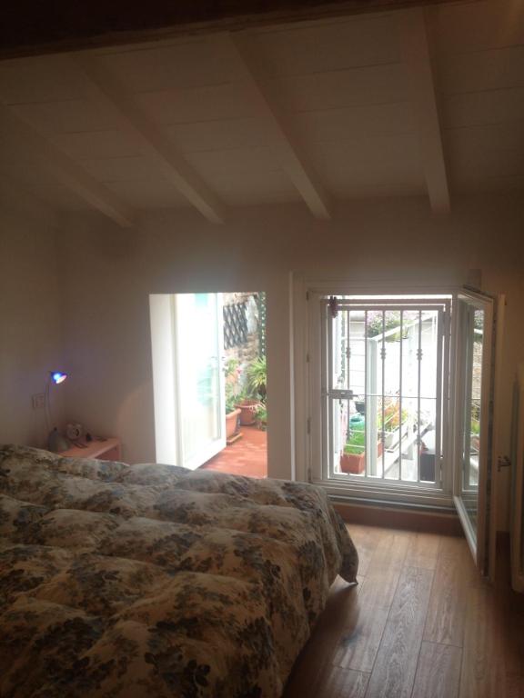 A bed or beds in a room at La Casina