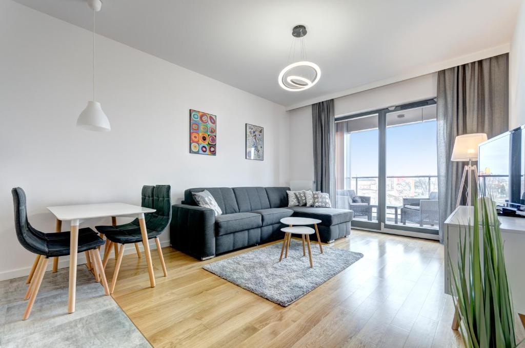 Posedenie v ubytovaní Apartments Brabank Old Town & by Noclegi Renters