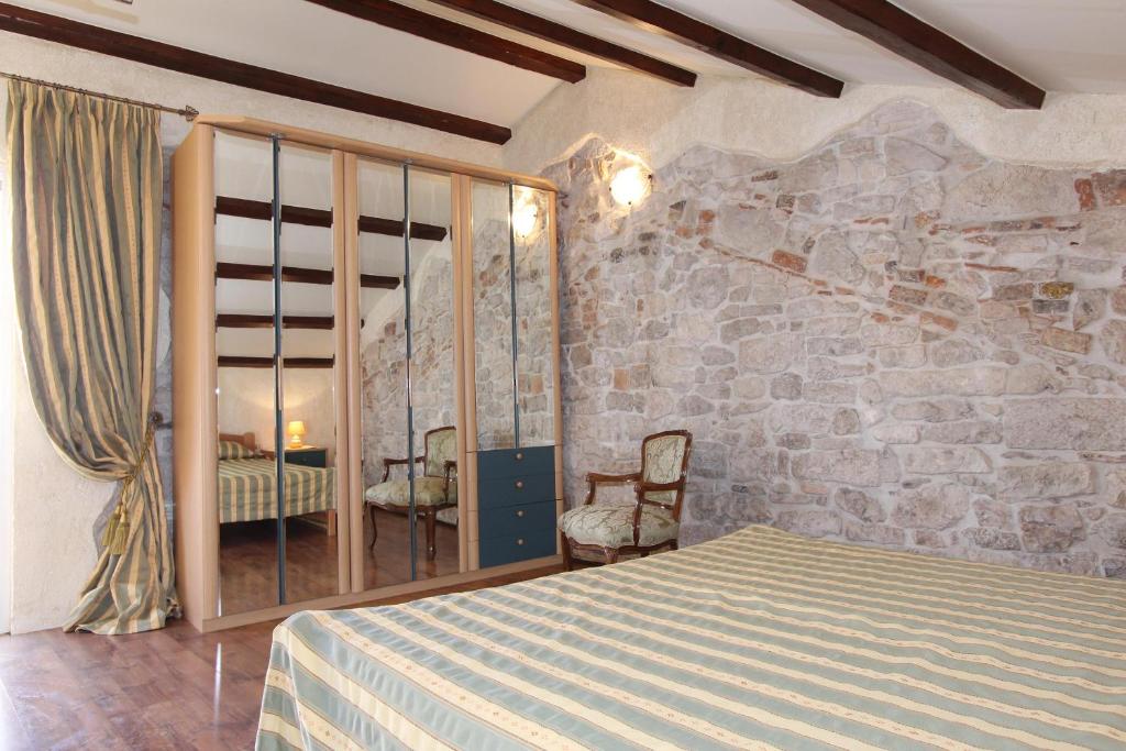 Łóżko lub łóżka w pokoju w obiekcie Apartment Midea