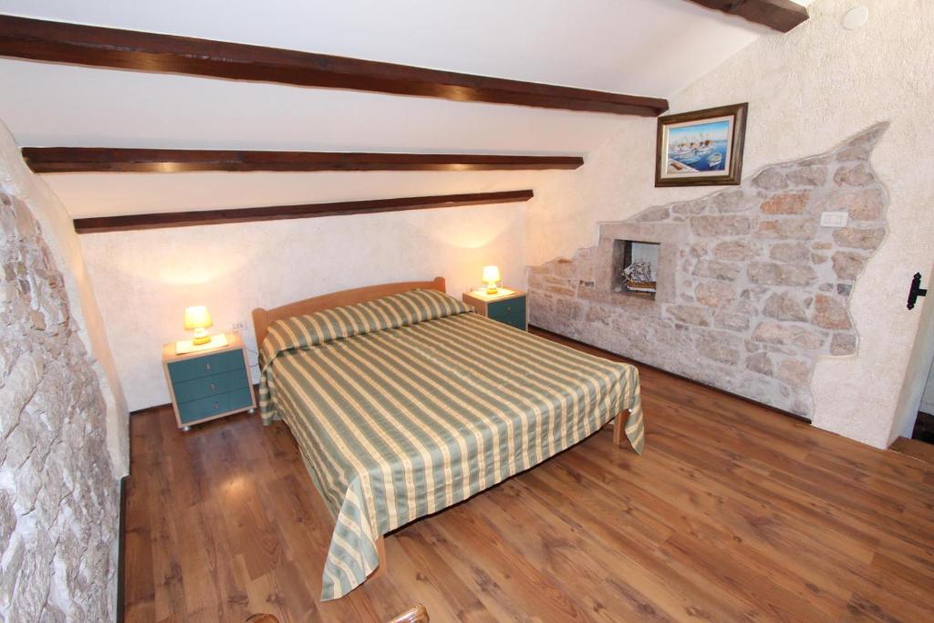 Łóżko lub łóżka w pokoju w obiekcie Apartment Midea