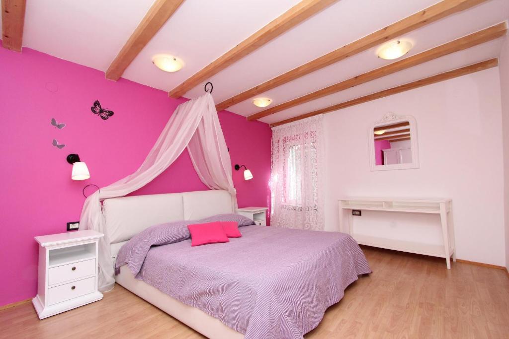 Łóżko lub łóżka w pokoju w obiekcie Apartment Midea