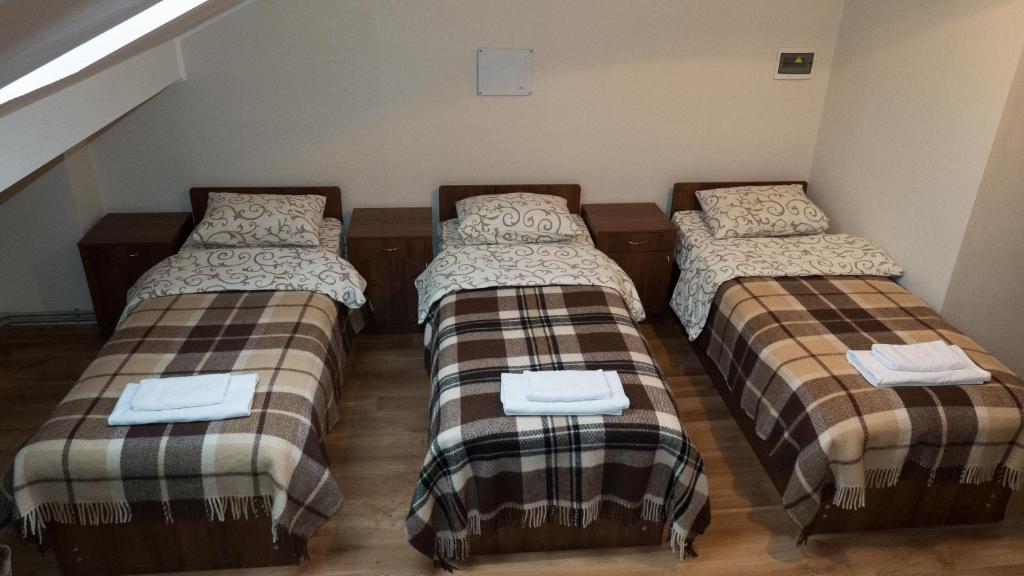 Postel nebo postele na pokoji v ubytování City Hostel