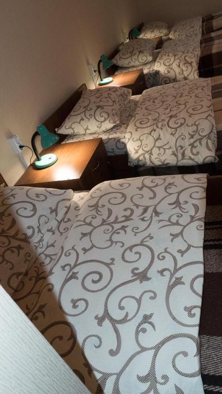 Postel nebo postele na pokoji v ubytování City Hostel