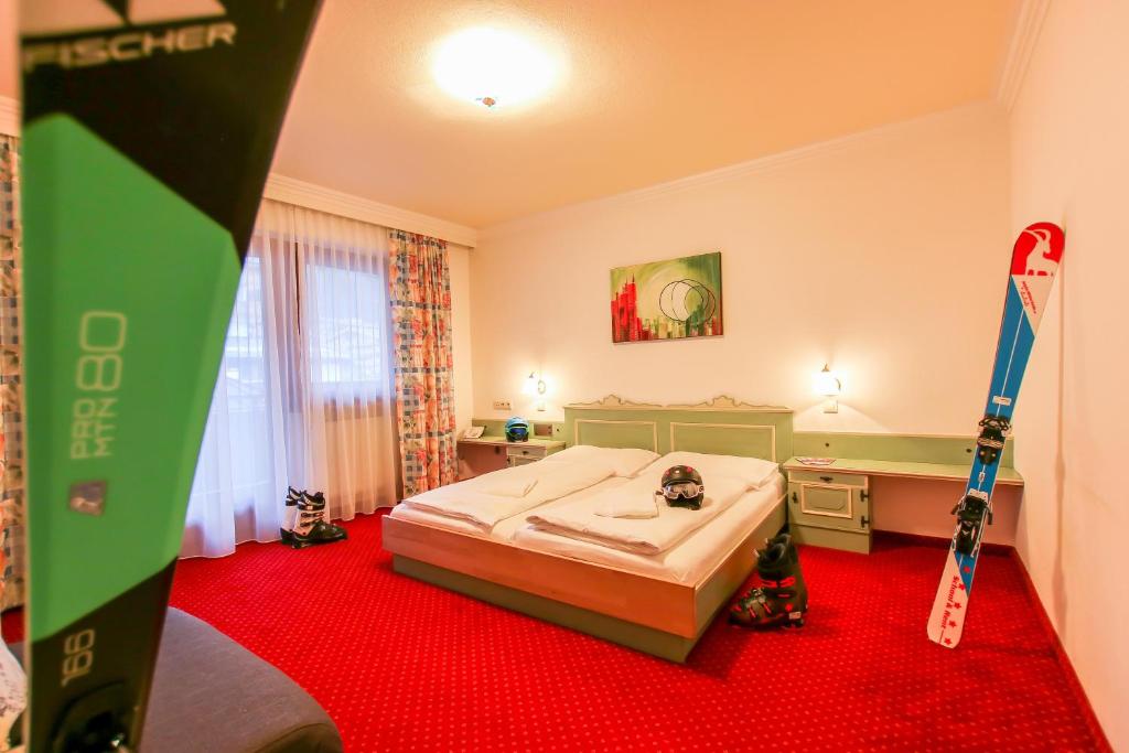 Postel nebo postele na pokoji v ubytování HELI'S Bed & Breakfast