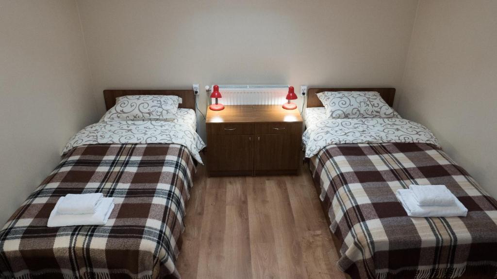 Postel nebo postele na pokoji v ubytování City Hostel