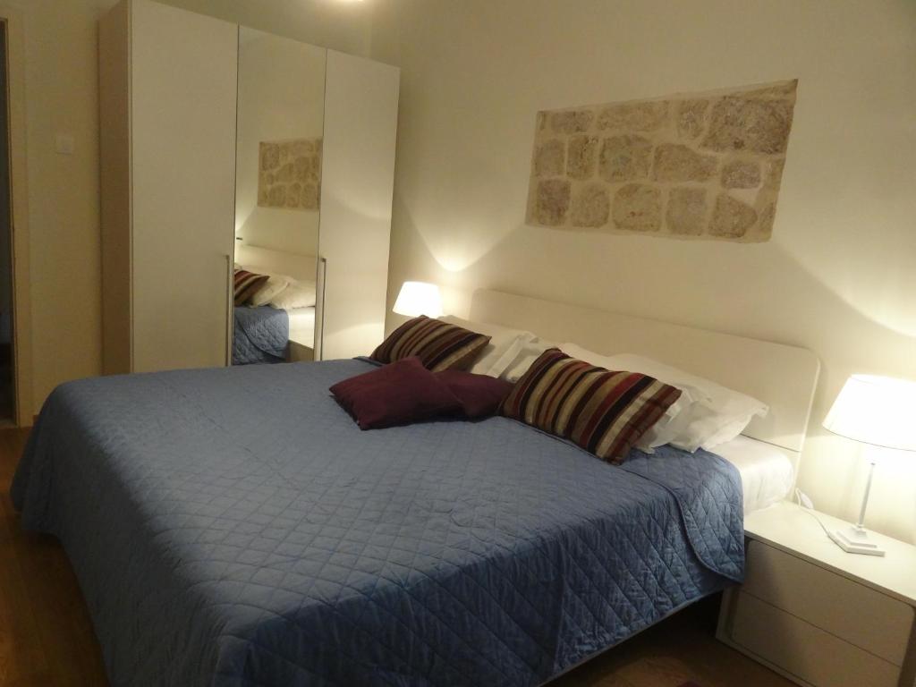 Posteľ alebo postele v izbe v ubytovaní Heart of the City Apartments