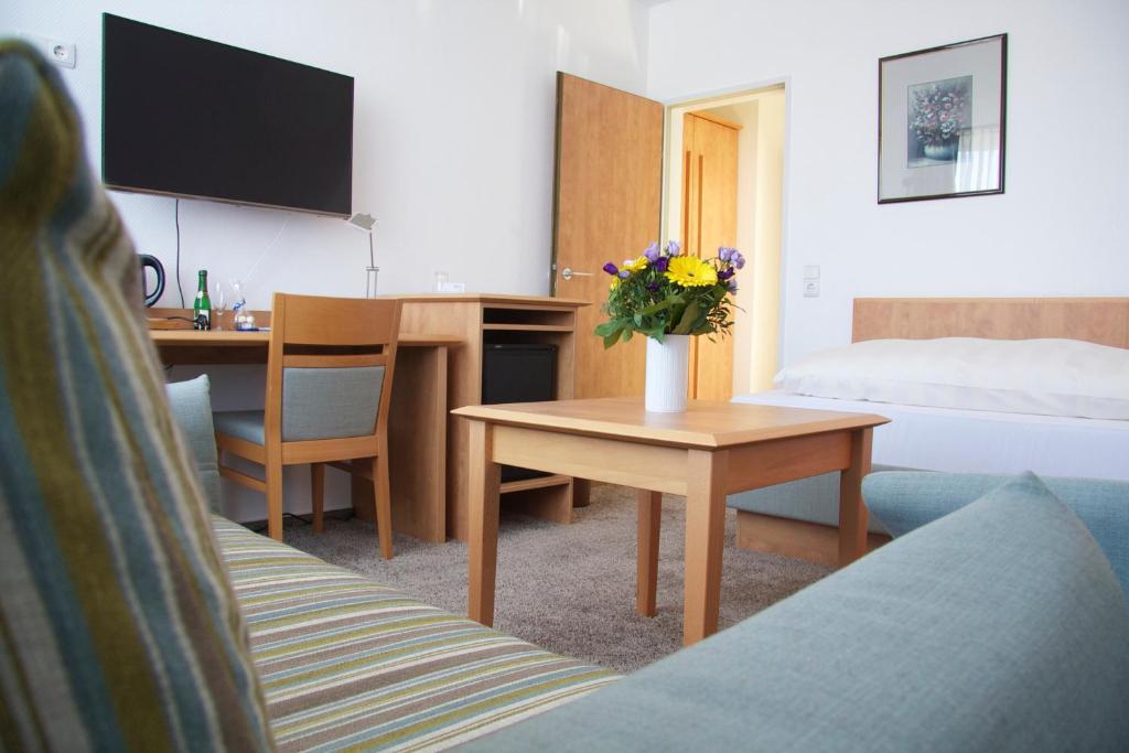 TV a/nebo společenská místnost v ubytování Hotel Flörke