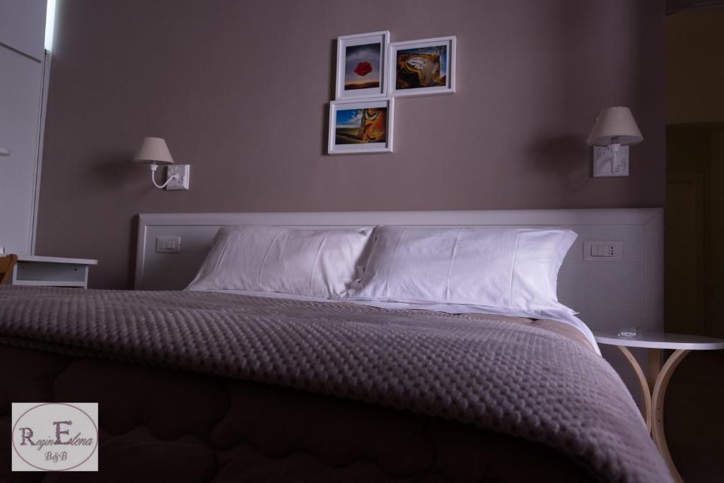 Postel nebo postele na pokoji v ubytování ReginElena B&B