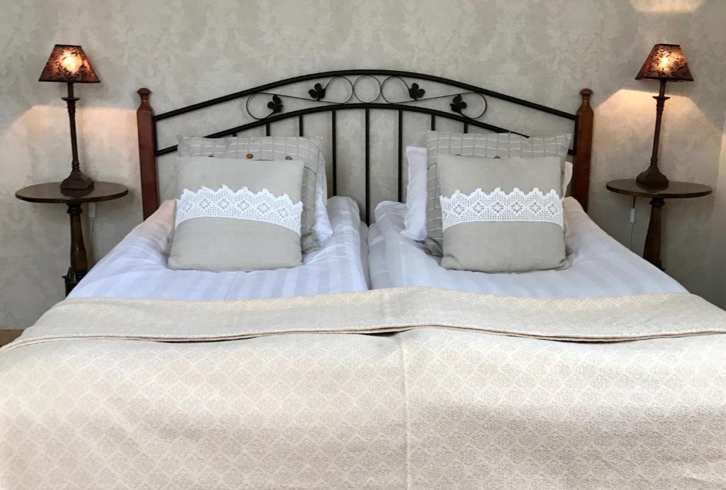 Postel nebo postele na pokoji v ubytování Hotell Viking