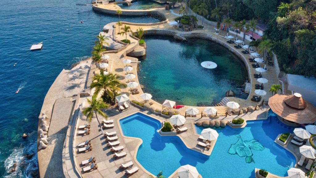 an aerial view of a resort with a pool at Las Brisas Acapulco in Acapulco