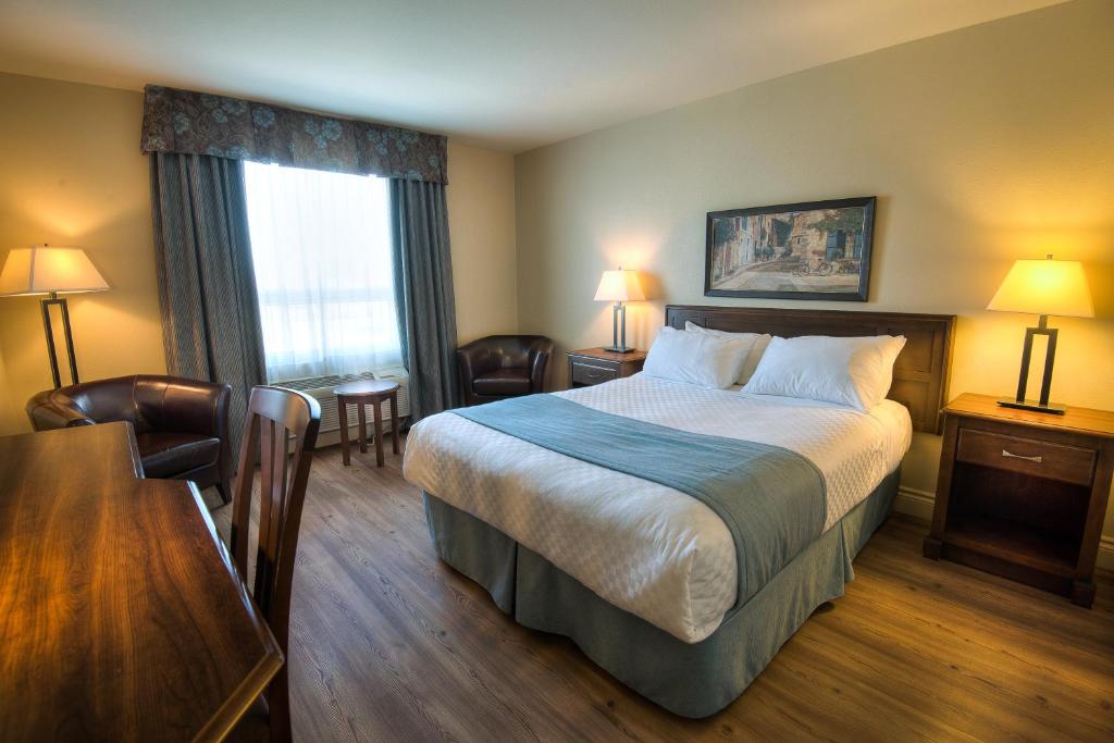 Postel nebo postele na pokoji v ubytování Days Inn by Wyndham Levis