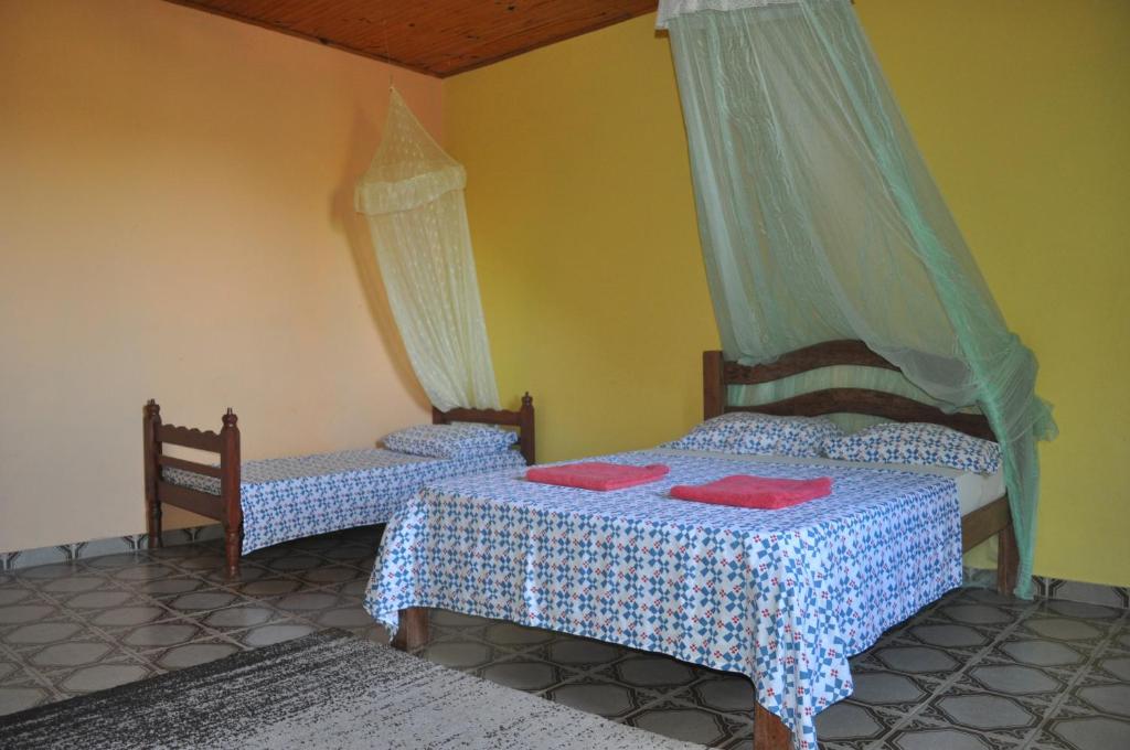 Uma cama ou camas num quarto em Sitio Os Tres