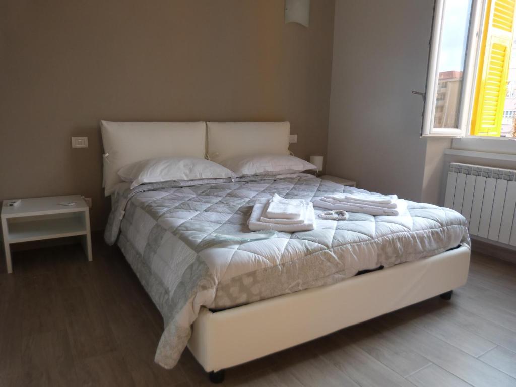 Un pat sau paturi într-o cameră la Ca' da Valeria