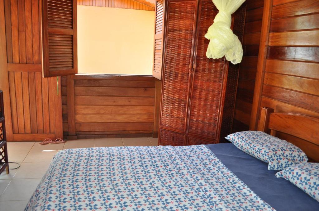Uma cama ou camas num quarto em Sitio Os Tres