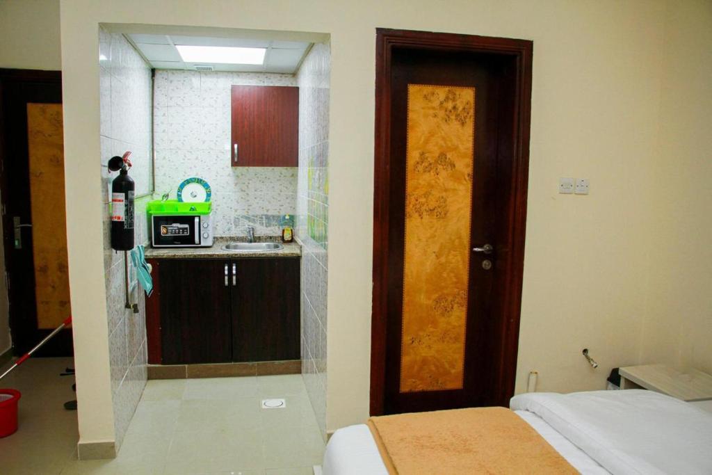 لابی و فضای عمومی THAAL Rooms Sharjah - تصویر ۵
