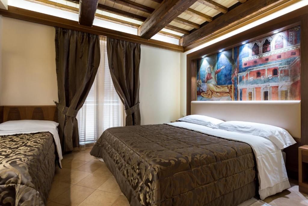 Postel nebo postele na pokoji v ubytování Hotel La Terrazza RESTAURANT & SPA